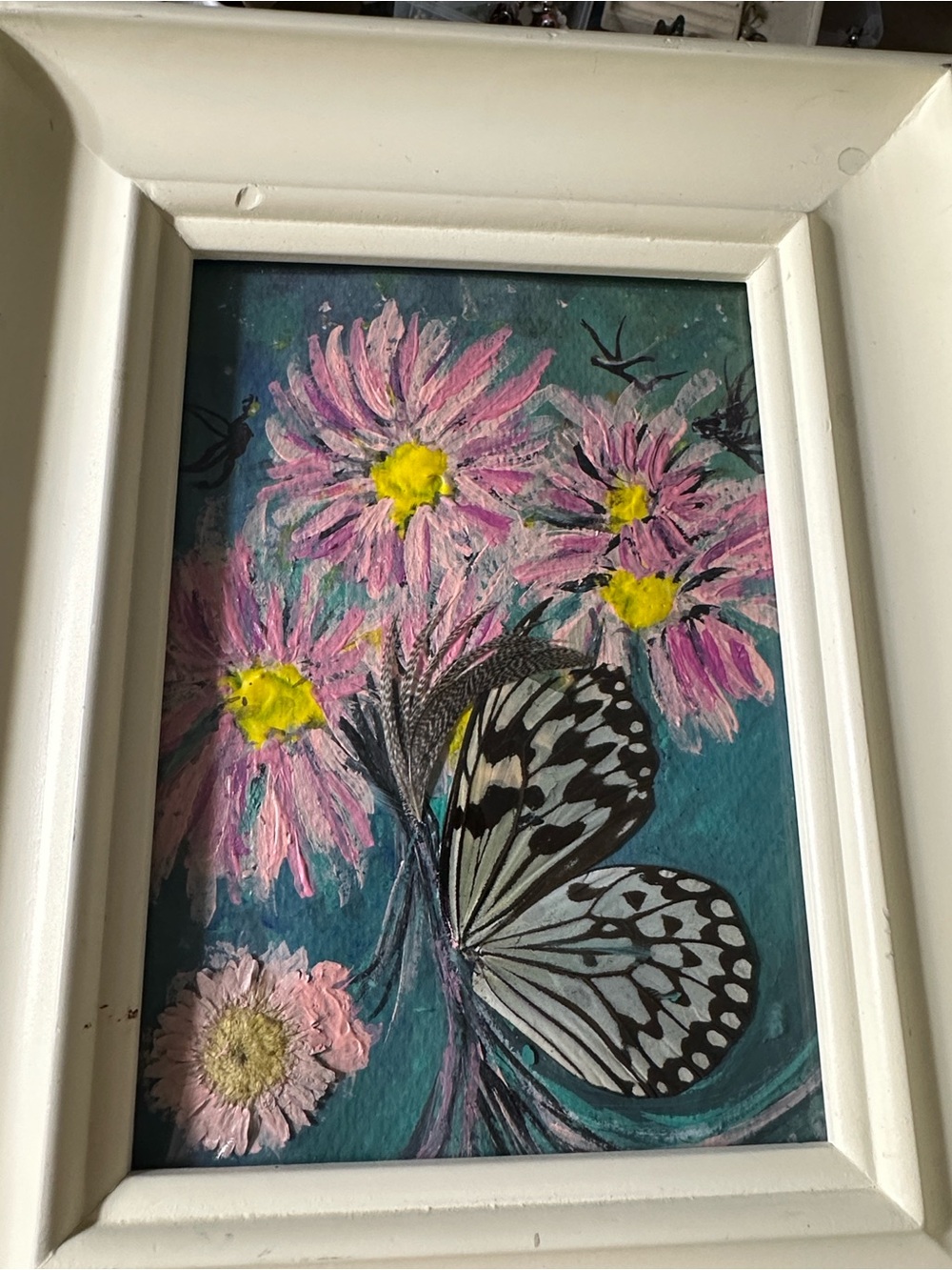 Artisans painted with real butterfly wings and pressed flowers made by lemon